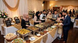 Guests enjoying an authentic halal family catering buffet by Babtooma Catering at a private event in Bradford, featuring Middle Eastern cuisine, professional buffet service, and freshly prepared halal dishes.